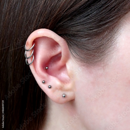 ear piercings photos.Helix piercing.Ear rings