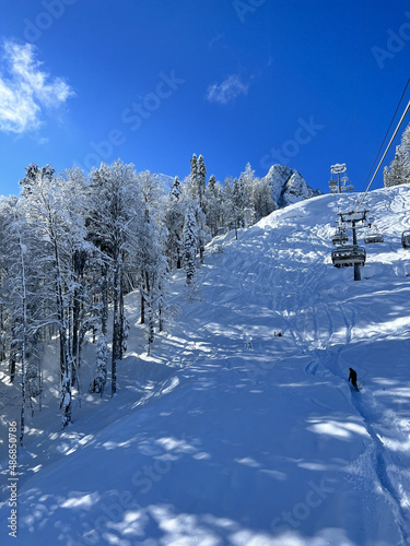 ski resort in the mountains in a sunny day