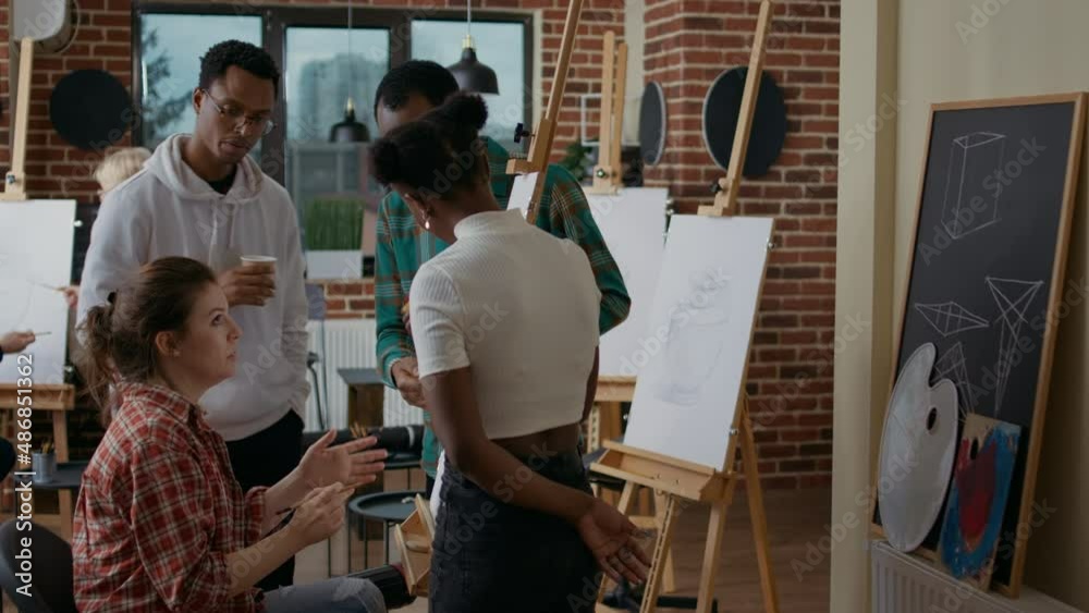 Group of artistic people brainstorming ideas to create drawing masterpiece on canvas. Educational workshop to learn to draw sketch model for personal growth as new years resolutions.