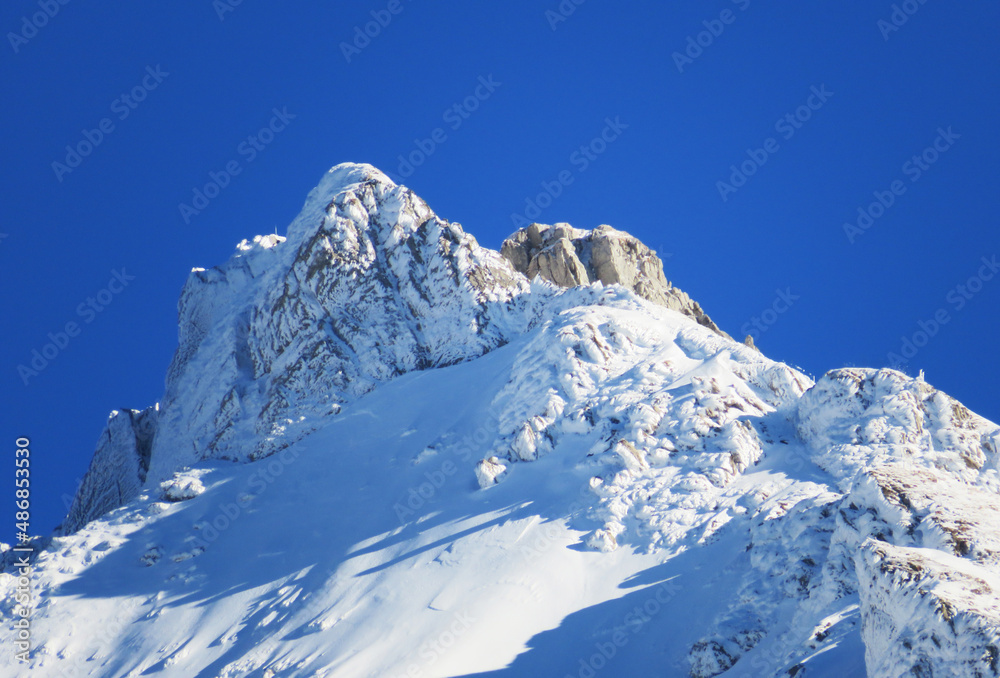Winter ambience and beautiful idyllic atmosphere on the steep alpine rocky peak Stooss or Stoss (2112 m.a.s.l.) and the mountain Alpstein - Appenzell Alps massif - Switzerland (Schweiz)