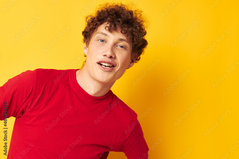 guy with red curly hair red t shirt fun posing casual wear isolated background unaltered guy with red curly hair red t shirt fun posing casual wear isolated background unaltered