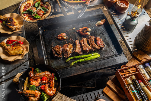 アウトドアでステーキ Beef steak grilled outdoors at camp 