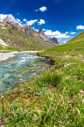 Summer trekking day in the mountains of Val Veny, Courmayeur