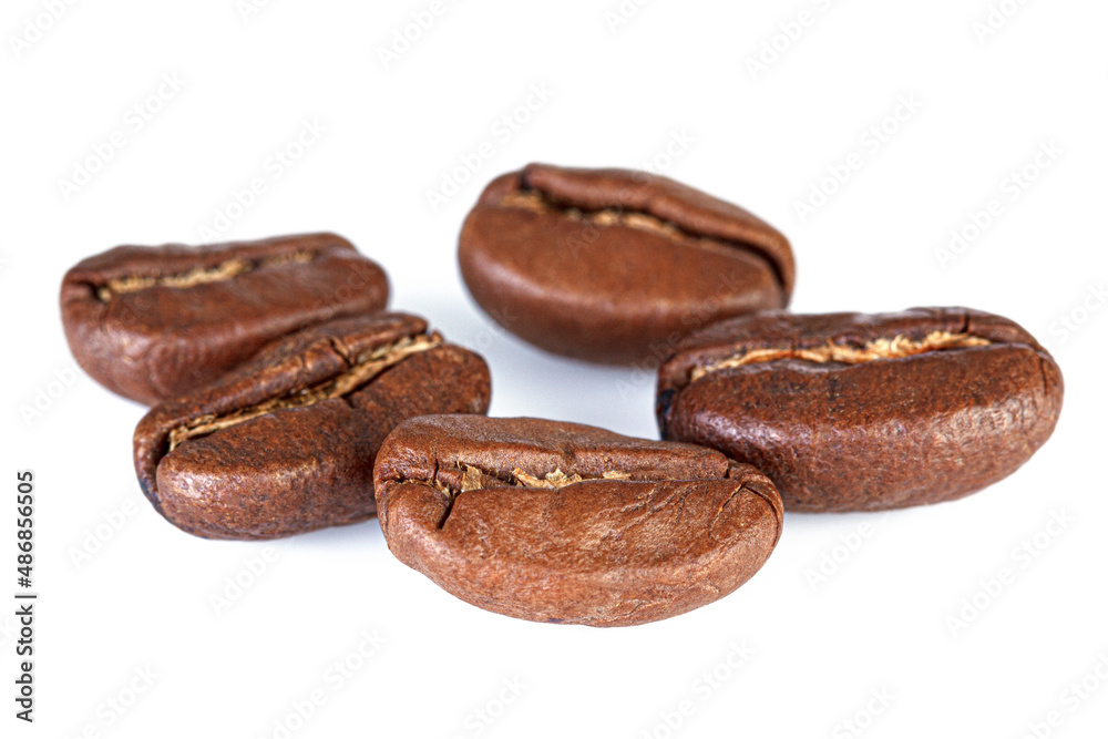Roasted coffee beans isolated in white background Roasted coffee beans isolated in white background