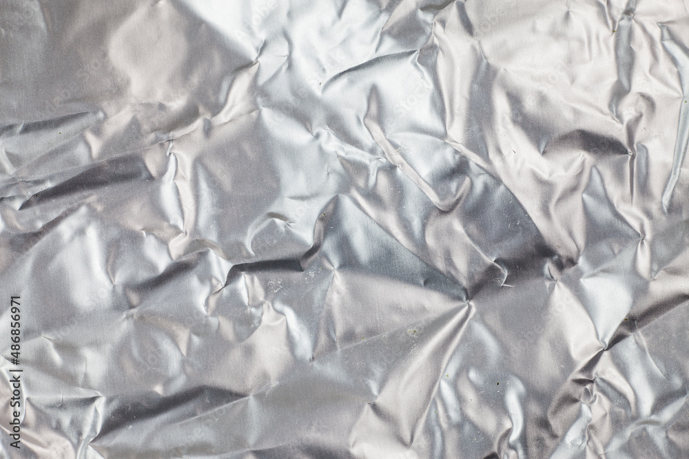 Crumpled aluminum foil background. Crumpled aluminum foil background.