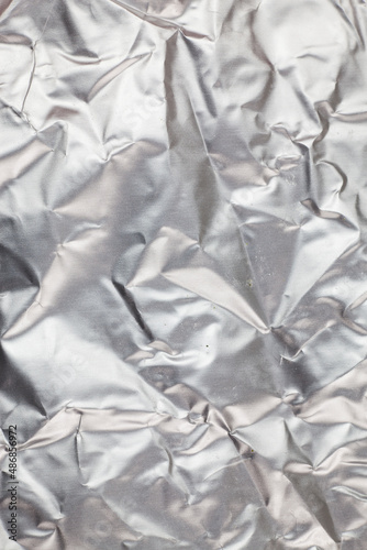 Crumpled aluminum foil background.