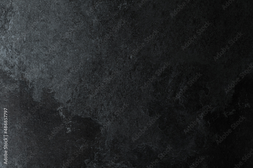Fototapeta premium Dark stone texture background, natural pattern.
