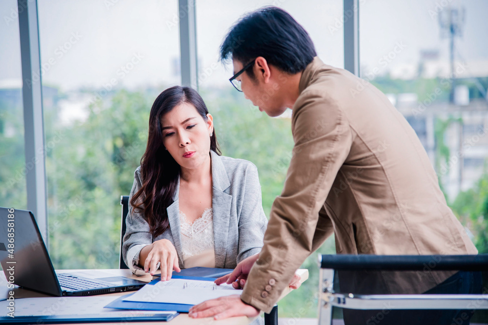 Asian Young teamwork meeting and discuss at the meeting room in office for smooth business ,colleagues,partnership, goal achievement concept. Asian Young teamwork meeting and discuss at the meeting room in office for smooth business ,colleagues,partnership, goal achievement concept.