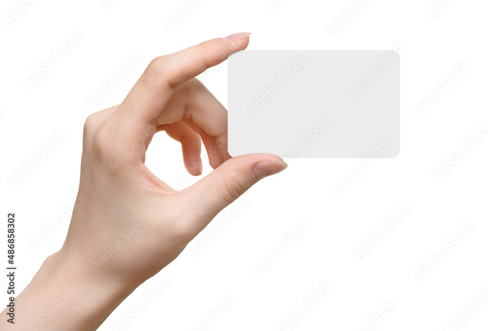 Womens hand holding bank card isolated on a white background Womens hand holding bank card isolated on a white background
