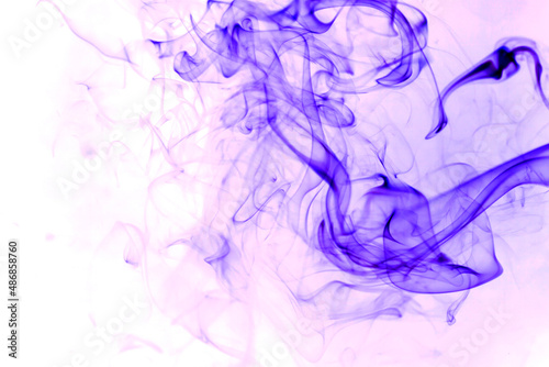 Purple smoke on a white background. © peterkai