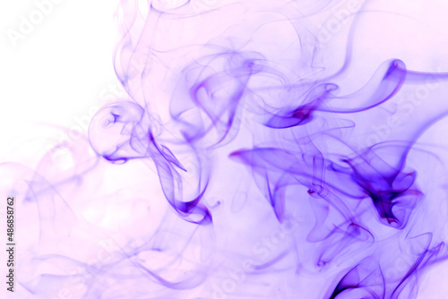 Purple smoke on a white background. © peterkai