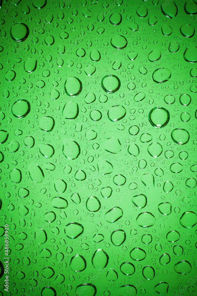 water drops on glass background. water drops on glass background.
