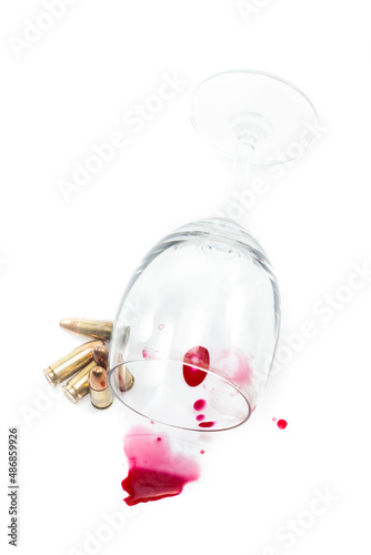 Wine glass and blood, bullet