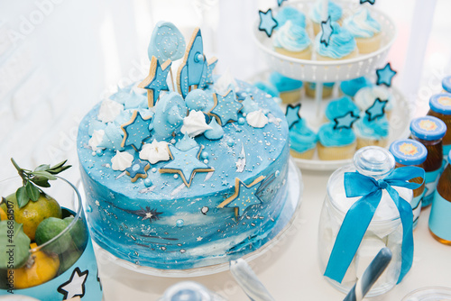 candybar in blue tones. cake, cookies, juice