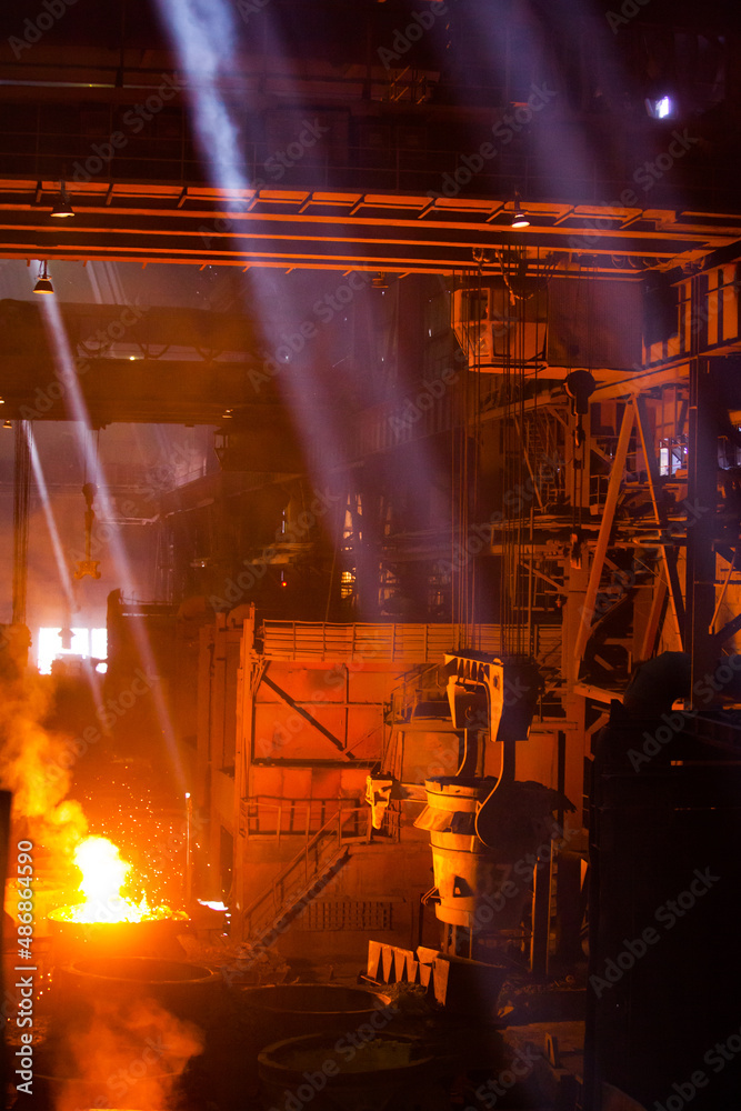 Fototapeta premium Aksu, Pavlodar region, Kazakhstan - May 29 2012: Metal alloy plant, smelter. Metallurgical bucket with liquid hot metal.