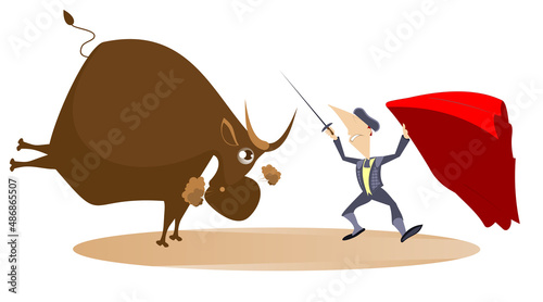 Bullfighter with a sword fighting to the bull. Bullfighter and a bull isolated 