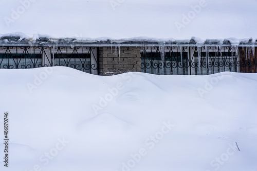 Snow covered the house to the roof