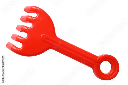 Children's toys red small rake isolated on white background