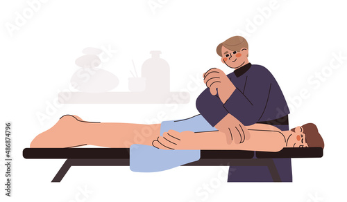 Flat chiropractor treating pain in lower back. Patient lying down on couch and doctor osteopath pressure to spine with elbow. Physiotherapist massaging to man. Rehabilitation or manual therapy.