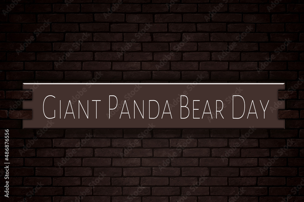 March month, day of March. Giant Panda Bear Day, on Bricks Background March month, day of March. Giant Panda Bear Day, on Bricks Background
