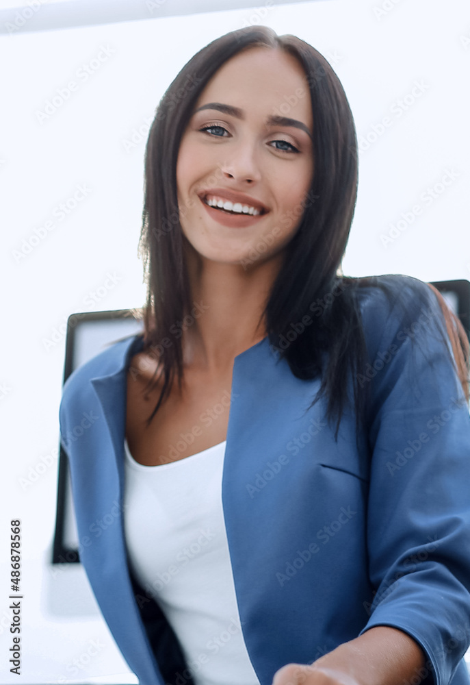 Face of beautiful cheerful smiling business woman on the backgro Face of beautiful cheerful smiling business woman on the backgro