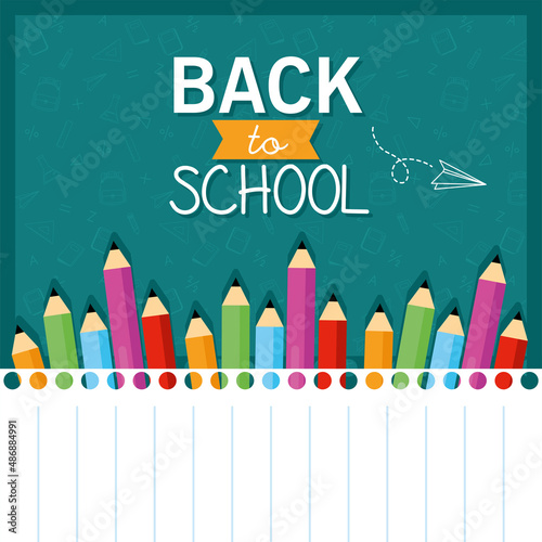 pencils over note