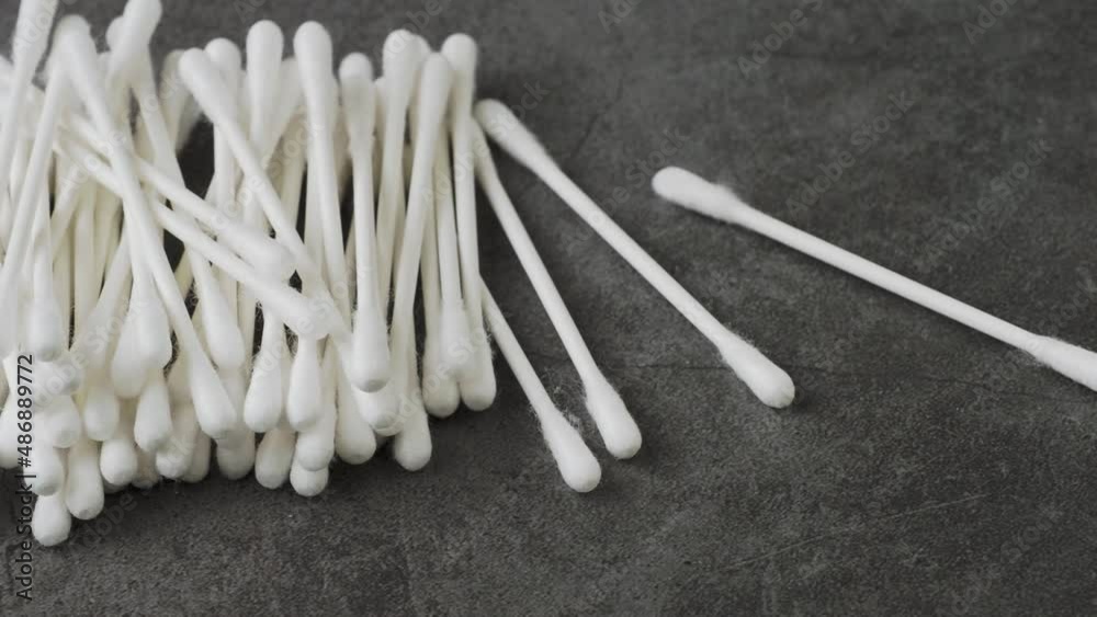 Ear sticks stacked pile isolated on black background Ear sticks stacked pile isolated on black background