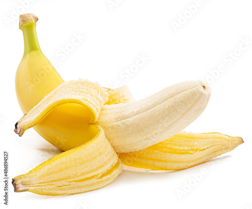 Canvas Print Peeled ripe yellow banana isolated on white background.