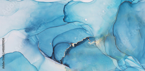Abstract alcohol ink painting texture in blue azure tones with golden splashes