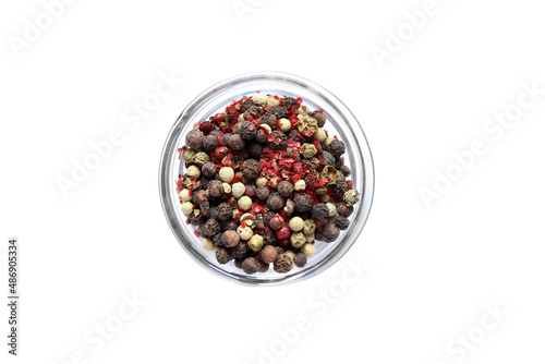 Series, spices on a white background, isolate, in different angles. Red, orange, bright pepper mix in a bowl