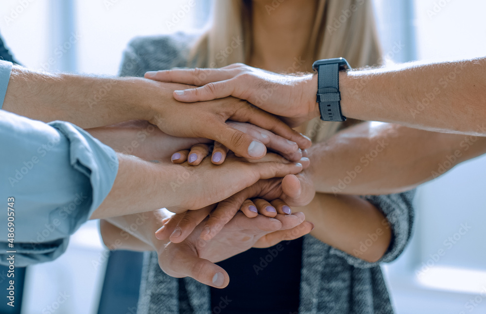 Business people joining hands. Team work concept. Business people joining hands. Team work concept.