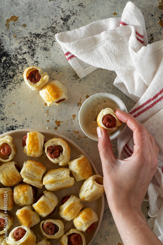 Pigs in a blanket with sauce