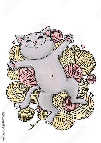 Funny grey cat on balls of yarn