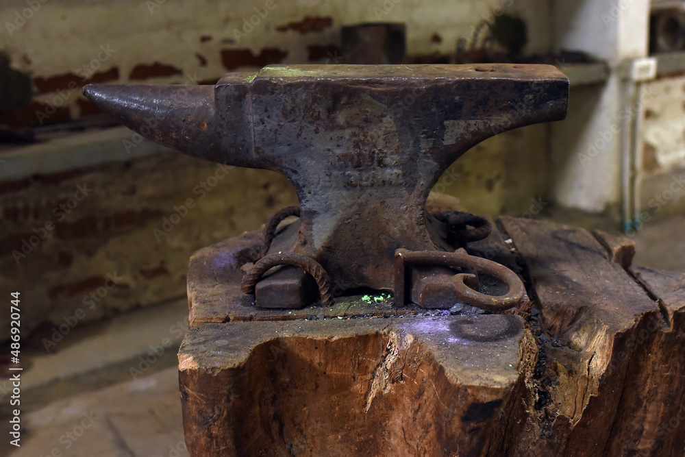 old iron anvil for forging metal in a smithy and forge,old iron tool,vintage.