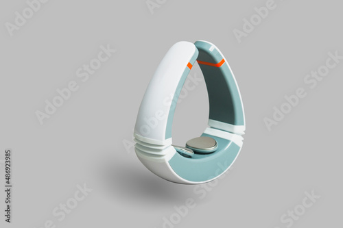 Electronic neck massager isolated on a gray background.