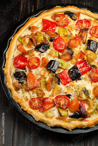 Overhead view of roasted vegetables and ricotta tart