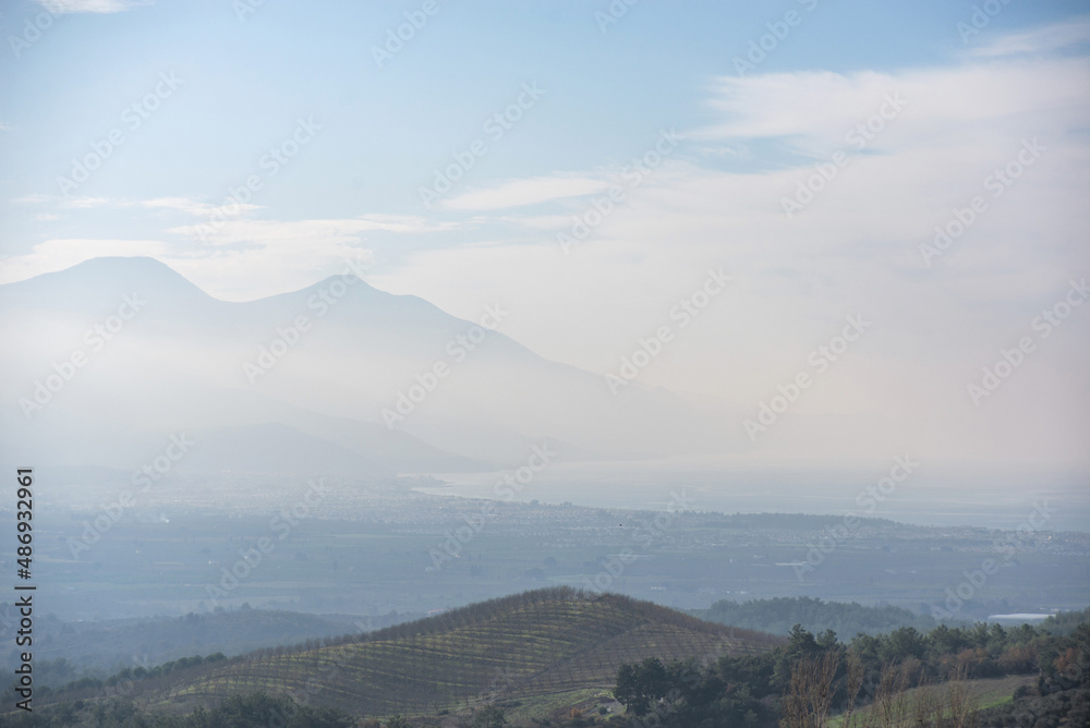 Kusadasi (Kushadasi) mountains area of Turkey, aerial foggy morning view