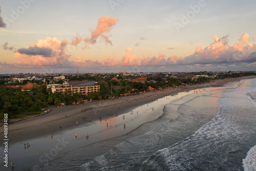 Aerial view of the famous Kuta beach at sunset in southern Bali in Indonesia photo