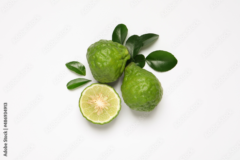 Flat lay composition with ripe bergamot fruits on white background