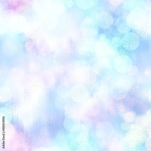 Seamless pale pastel tie dye bokeh texture. Soft tone on tone summer repeat background with washed out sun bleached ink dyed effect. 