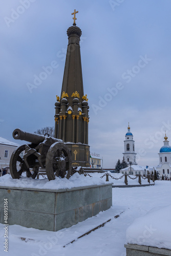 view of the monument to the heroes of the war of 1812 and the cannon on a winter day photo