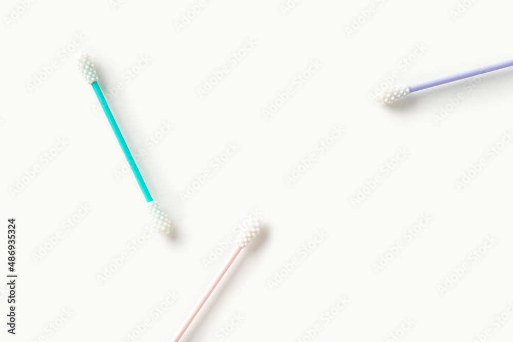 Flat lay top view reusable silicone swab buds on white background