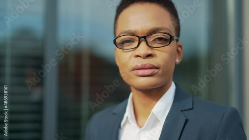 Wallpaper Mural portrait of confident serious african american business woman standing with arms crossed looking at camera. outdoors. Independent female teacher or associate professor with glasses on the outside Torontodigital.ca