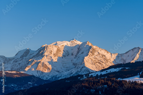 Mont Blanc massif at sunset in Europe, France, Rhone Alpes, Savoie, Alps, in winter, on a sunny day. © Florent