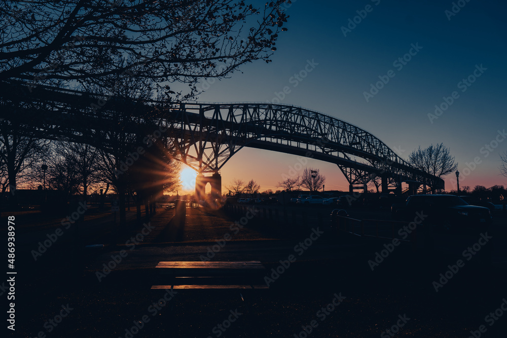 Blue Water Bridge in Sarnia, Ontario, Canada looking into Port Huron, Michigan, United States of America. An international boarder crossing suspension bridge at night