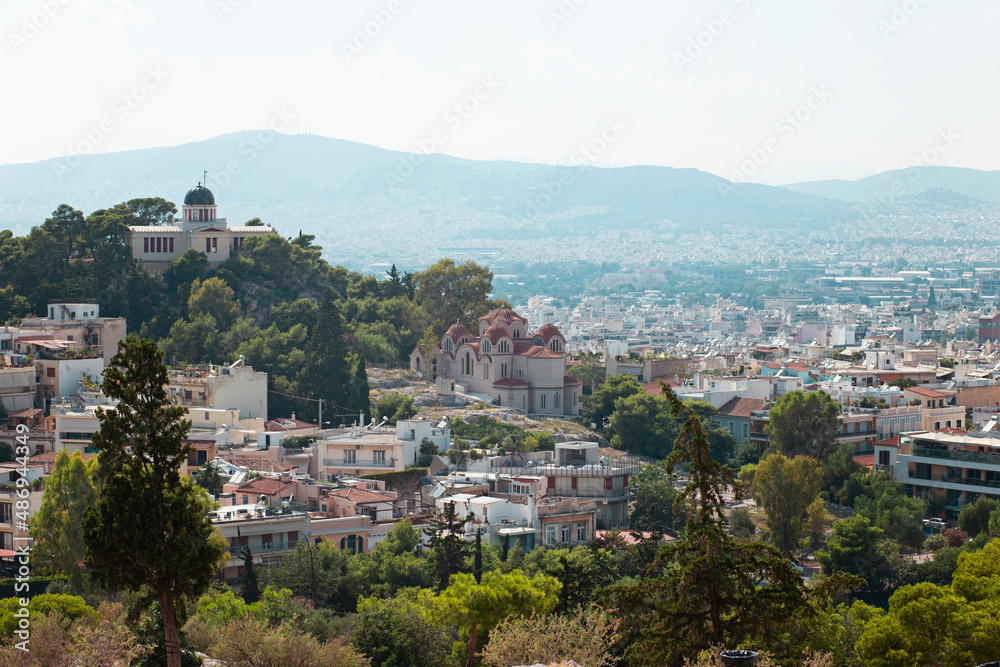Panorama of Athens from the Acropolis Hill, Greece. View of temples and houses in the center of Athens in summer.