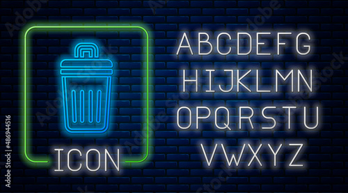 Glowing neon Trash can icon isolated on brick wall background. Garbage bin sign. Recycle basket icon. Office trash icon. Neon light alphabet. Vector
