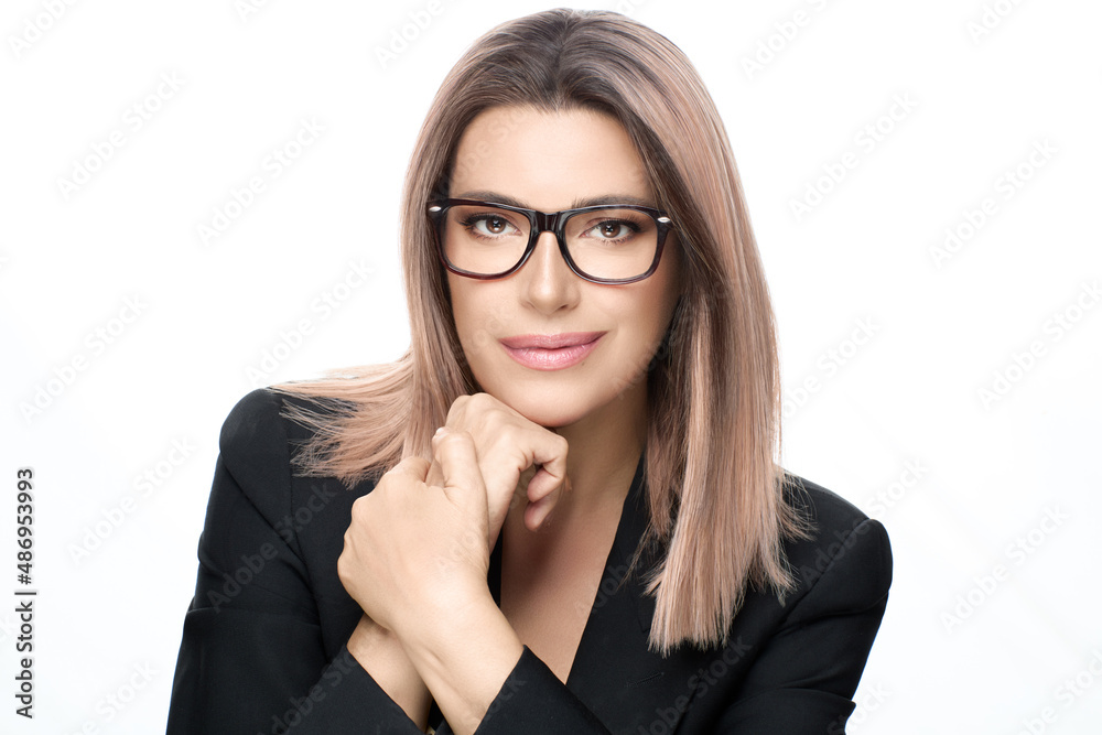 Attractive businesswoman in spectacles and suit. Isolated on white with copy space