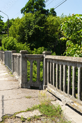 Old century old bridge in the park area