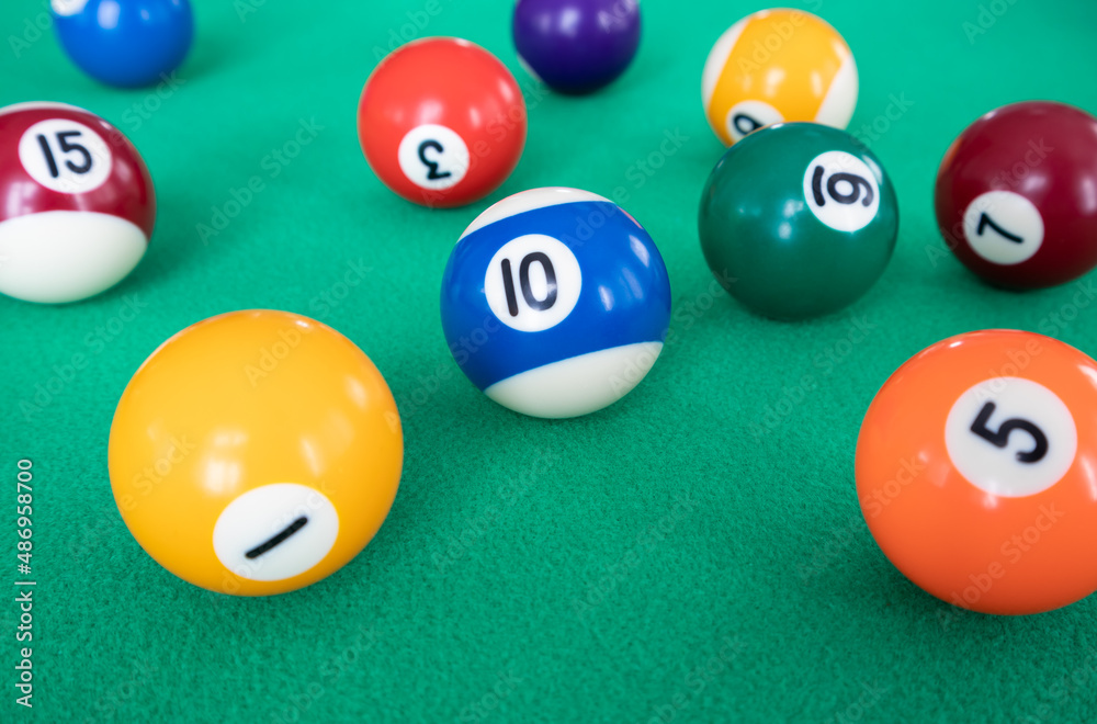 Billiard table with a selection of balls. Game. Snooker, billiards. Billiard table with a selection of balls. Game. Snooker, billiards.